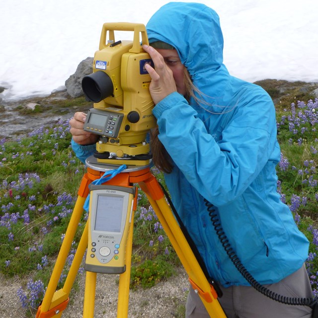 scientist using survey instrument