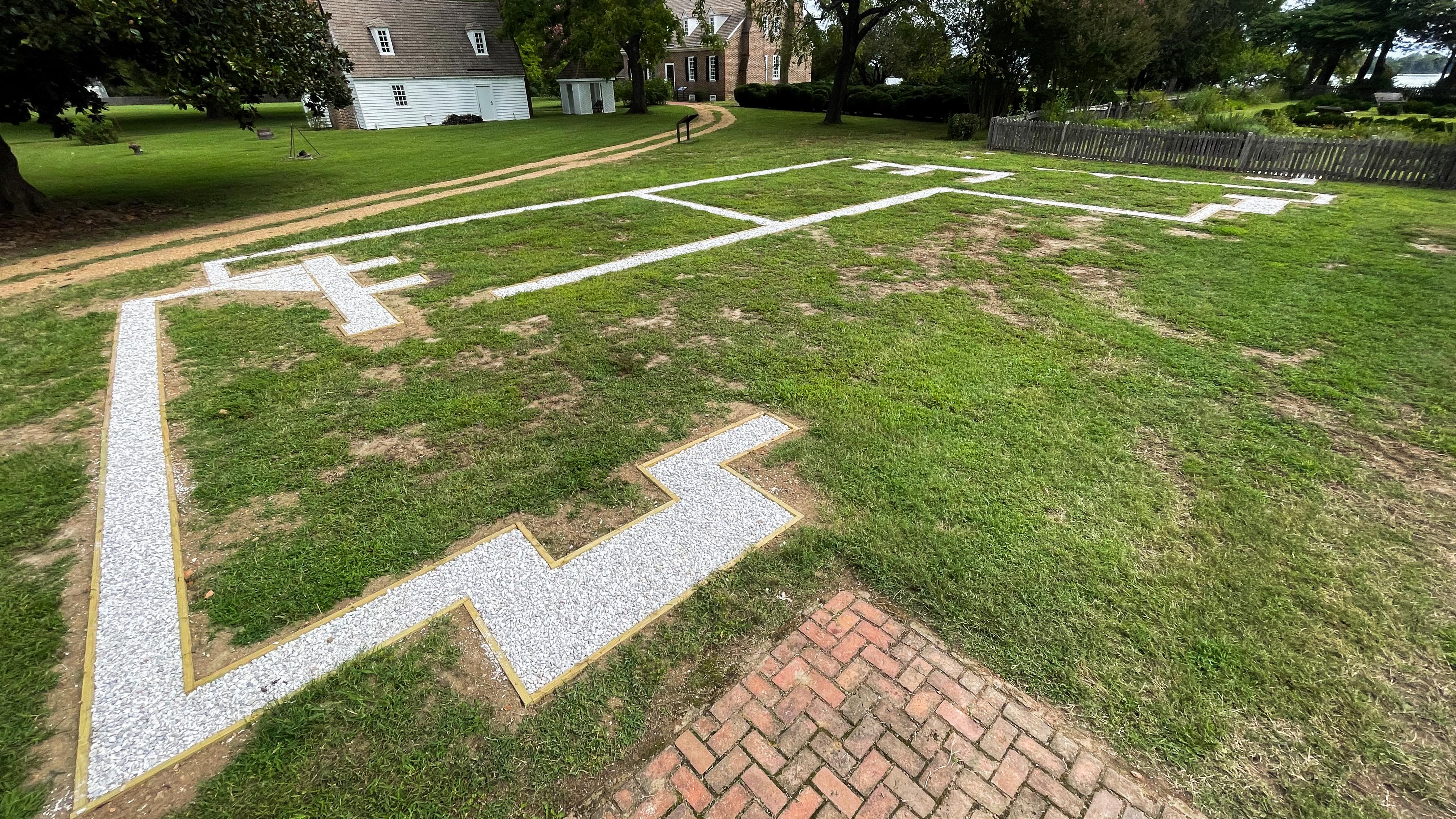 An outline of a foundation using crushed oyster shells.
