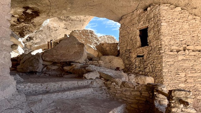 An image of the inside of the dwellings with stone masonry construction visible.