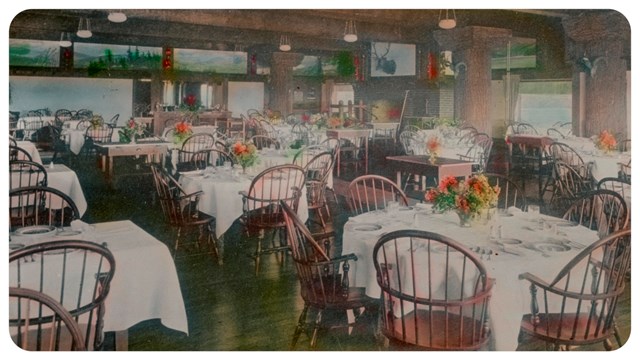 Interior of a dining hall with many chairs.