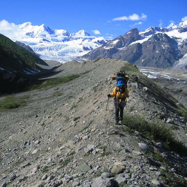 hiker on glacial moraine