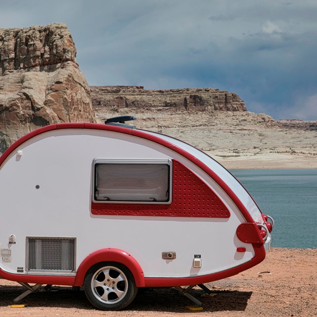 Teardrop camper parked on Lone Rock Beach