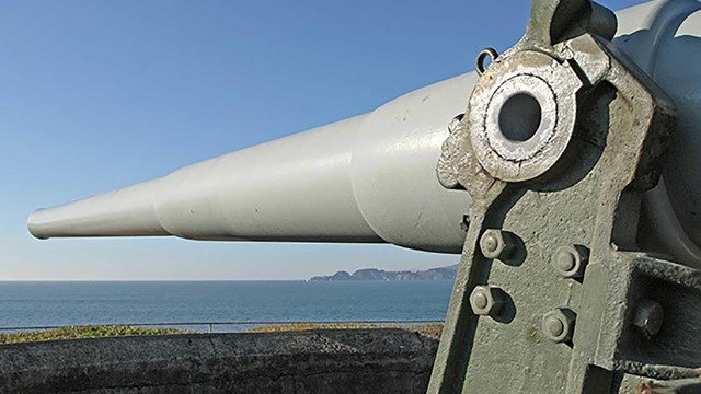 Battery Chamberlin gun tube pointed toward ocean view