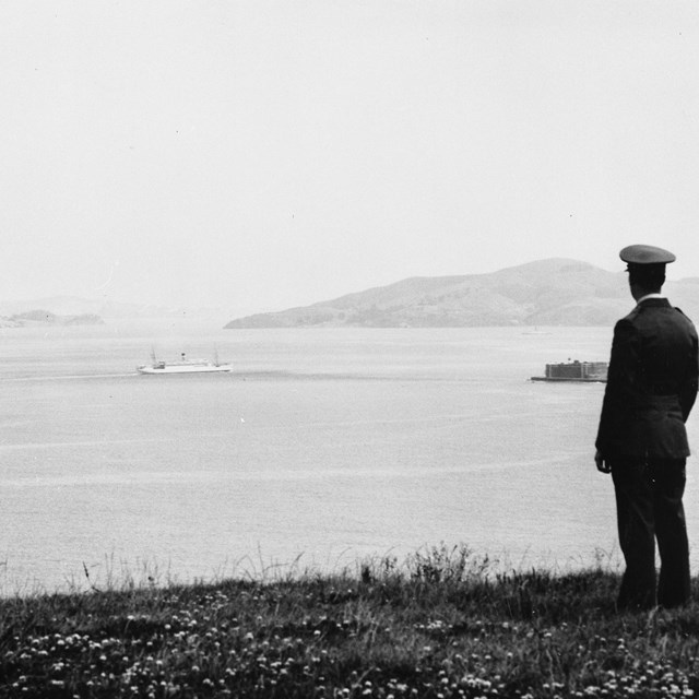 Soldier stares across the bay 