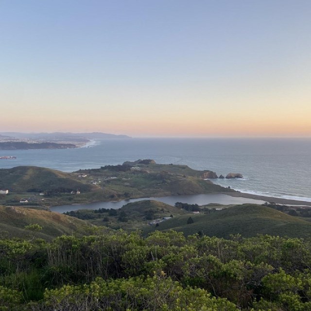 View of Rodeo Lagoon and Rodeo Beach from Hill 88. San Francisco is in the distance.