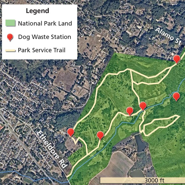 Map showing park service land and trails near San Vicente Creek and locations of dog waste stations