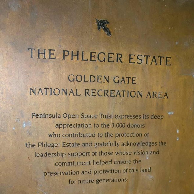 gold sign engraved with Phleger Estate