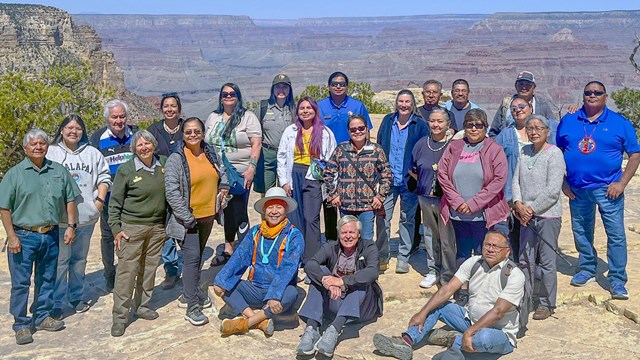 Members of the Intertribal Working Group at the rim of the canyon 