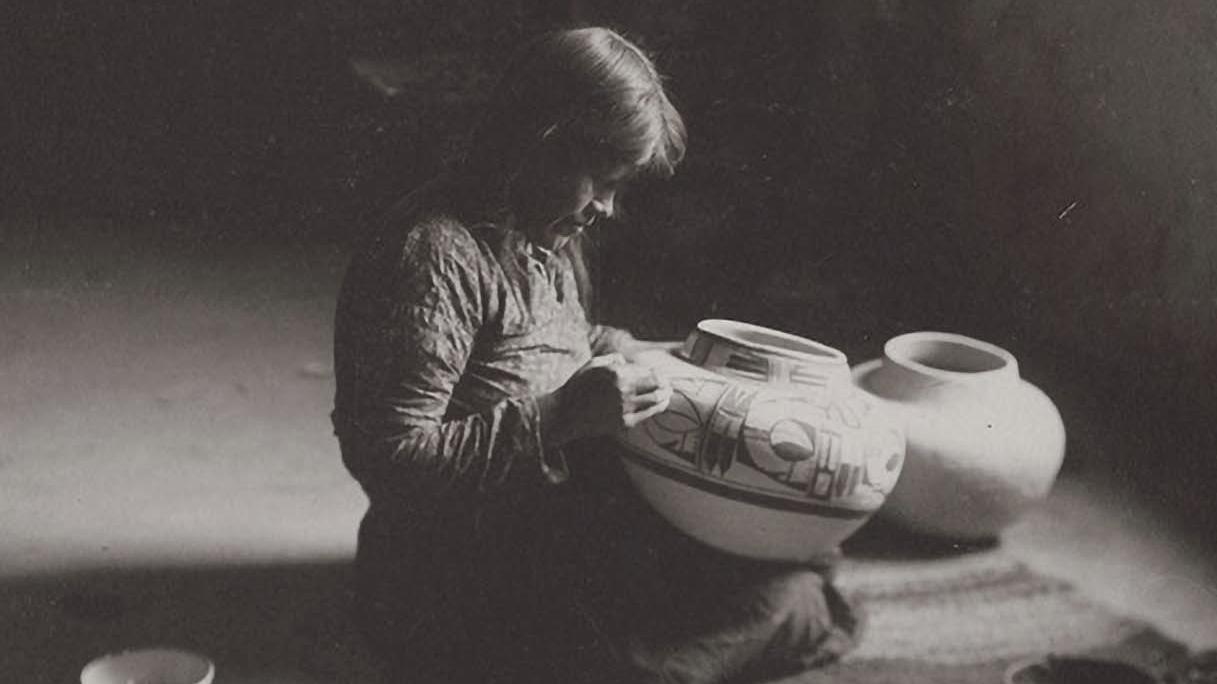 Nampeyo working on pottery inside