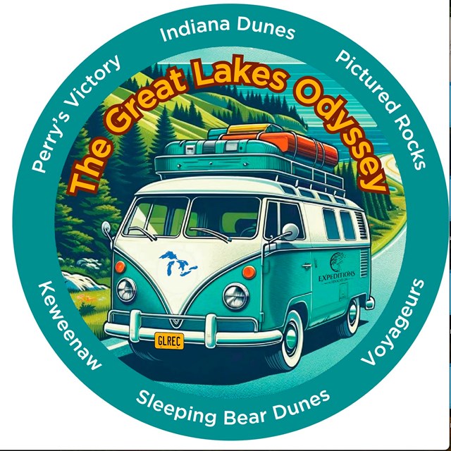 Logo that includes image of a blue Volkswagon van with Great Lakes on hood