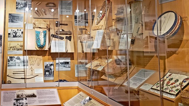 Museum display featuring Anishinaabe items.