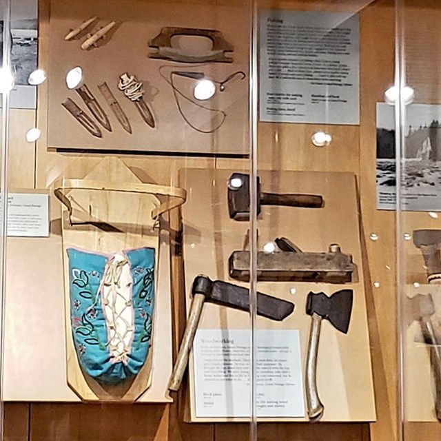 Museum display featuring Anishinaabe items.