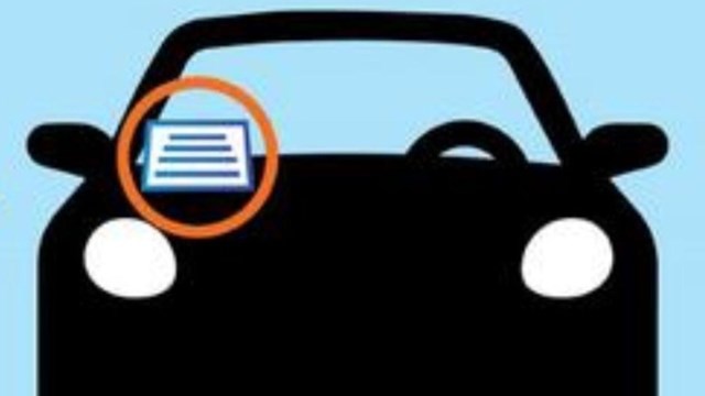 A car cartoon with a paper in the windshield.