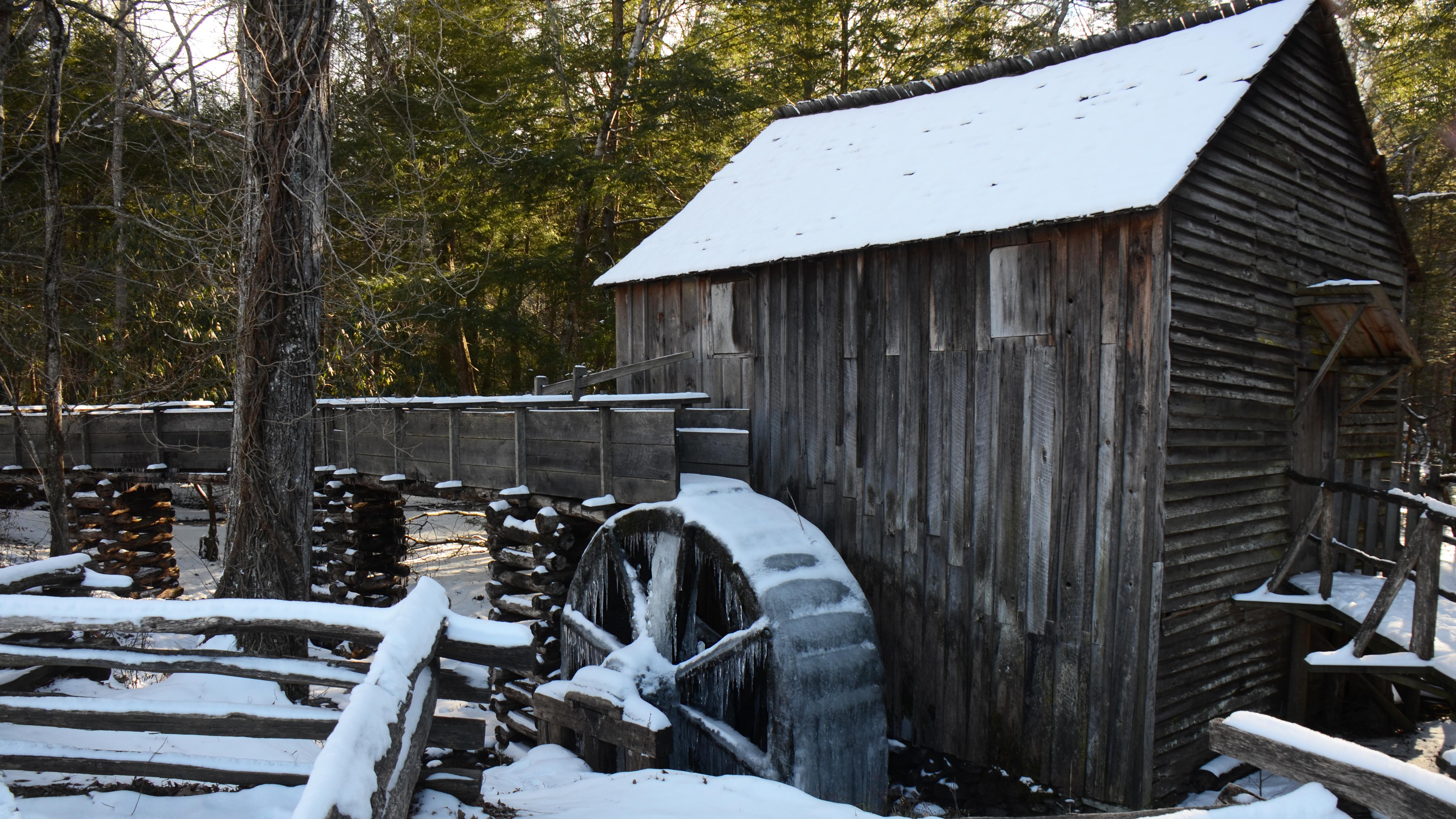 A mill house covered in snow.