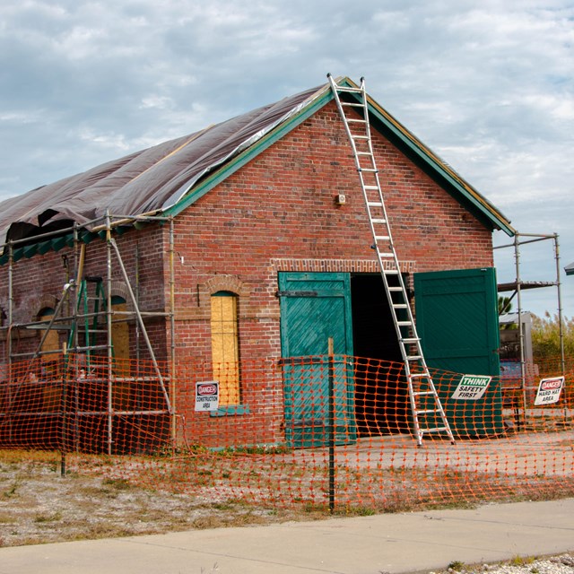A historic building being repaired.