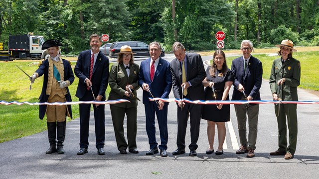 Officials cut a ribbon