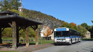 Park shuttle bus arrives at bus stop in Lower Town
