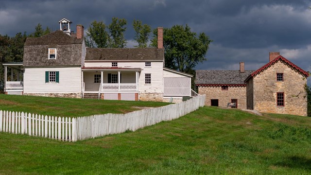 The Overseer's House (left), Enslaved Workers' Quarters (right)Credit: Maximilian Franz Photography 