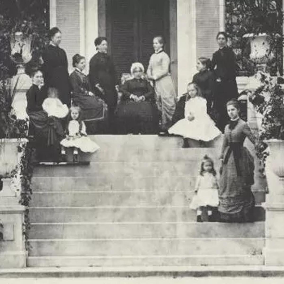 4 generations of ladies and girls of the Ridgely family on the north portico of Hampton mansion, NPS