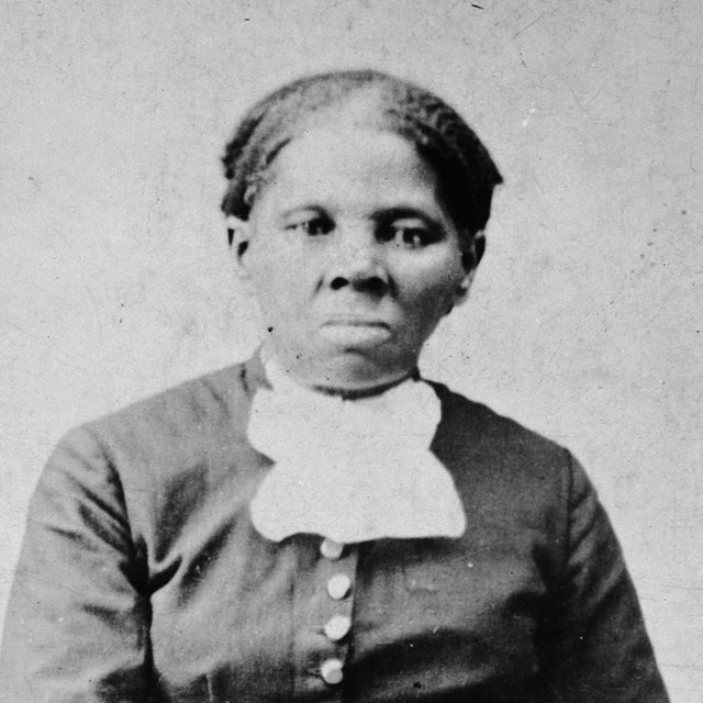 Black and white photograph of Harriet Tubman looking directly at camera