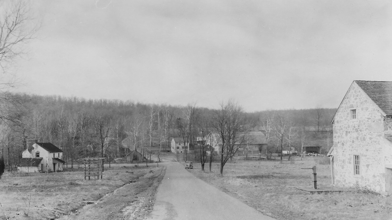 Black and white image of buildings related to furnace operation