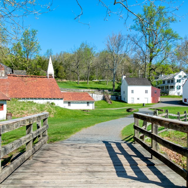 A view of the iron plantation looking towards the Cast House, Barn, and Iron Master's Mansion.