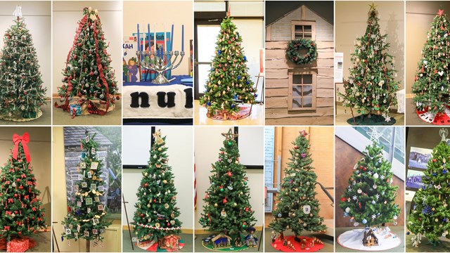 Three Christmas trees decorated with ornaments symbolically tied to homesteading cultures.