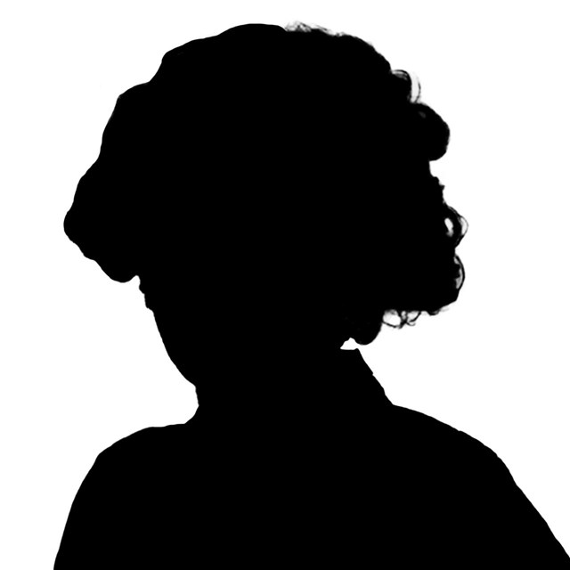 A black silhouette of a woman. 