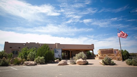 the Hovenweep Visitor Center with the American flag flying outside