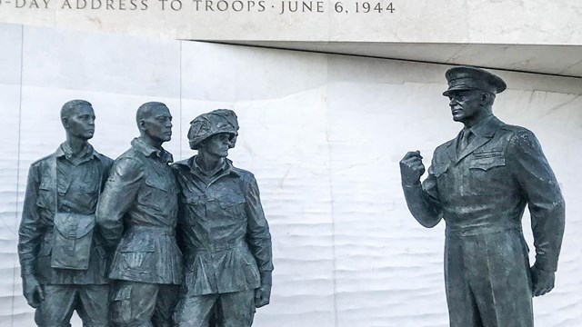 Statue of Dwight D. Eisenhower talking to soldiers