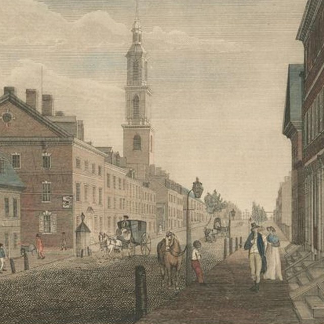 Print from 1800 showing people strolling past brick homes on Arch Street.