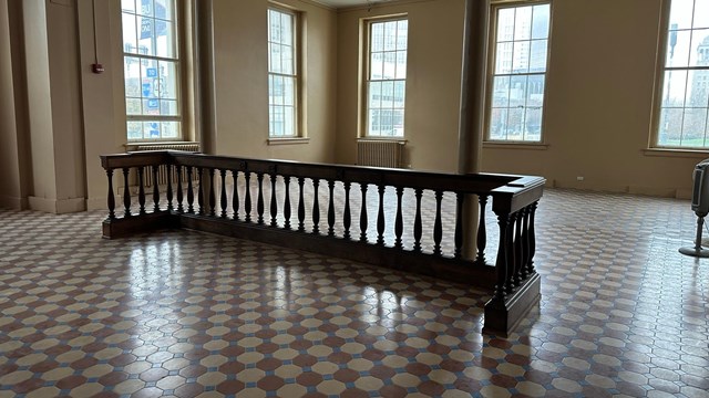 an empty courtroom in the Old Courthouse 