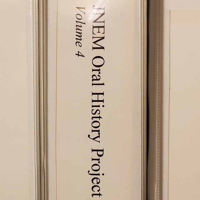 Binders side by side, each titled 