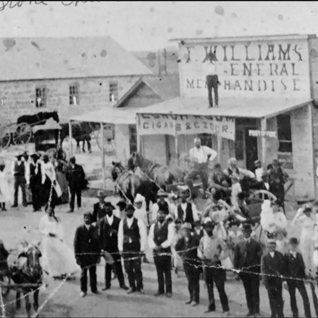 A black and white photo of a historic town
