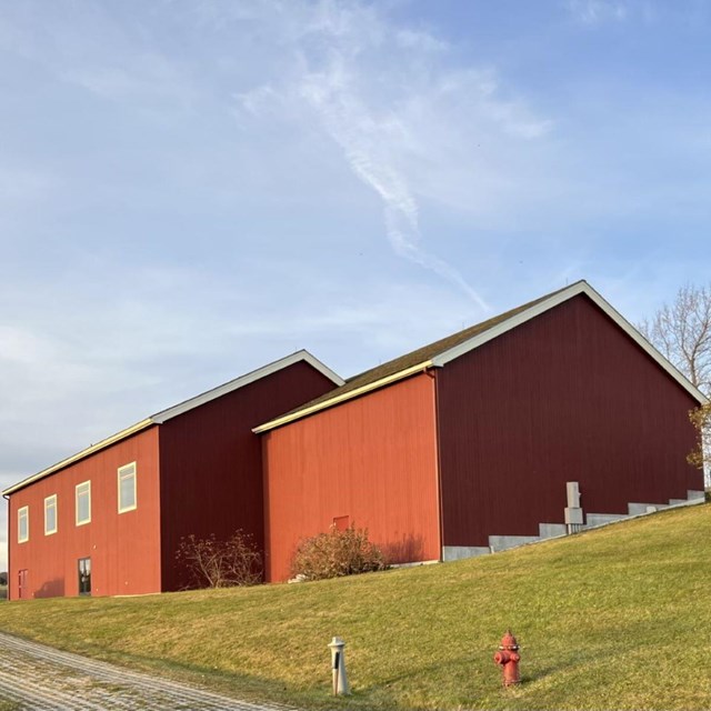 Red barn that is the Visitor Center.