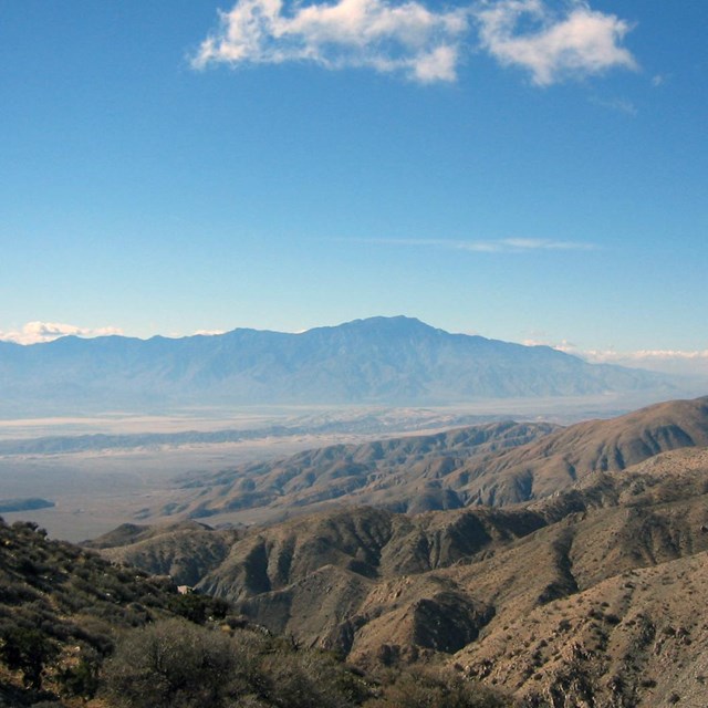 Clear view in the direction of Coachella Valley. Mountains are seen in the distance.