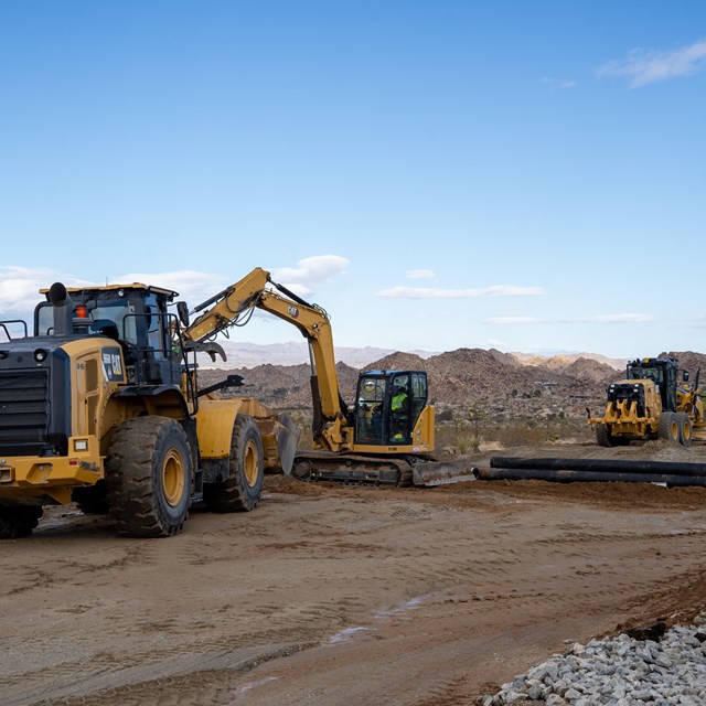 A construction site with large machinery.