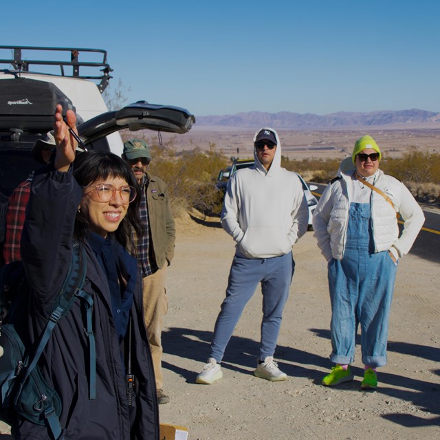 A Volunteer Coordinator speaking to a group.