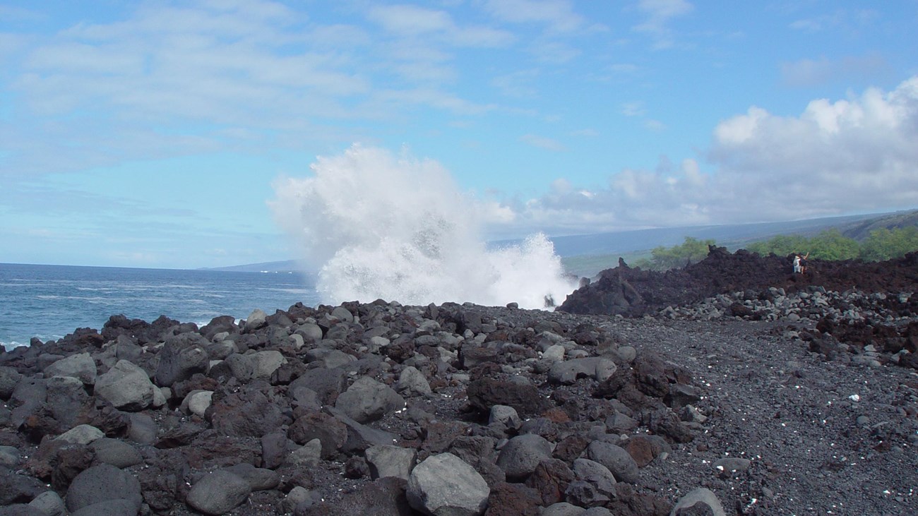Wave breaking on rocky shore