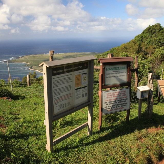 Two informational signs at an overlook