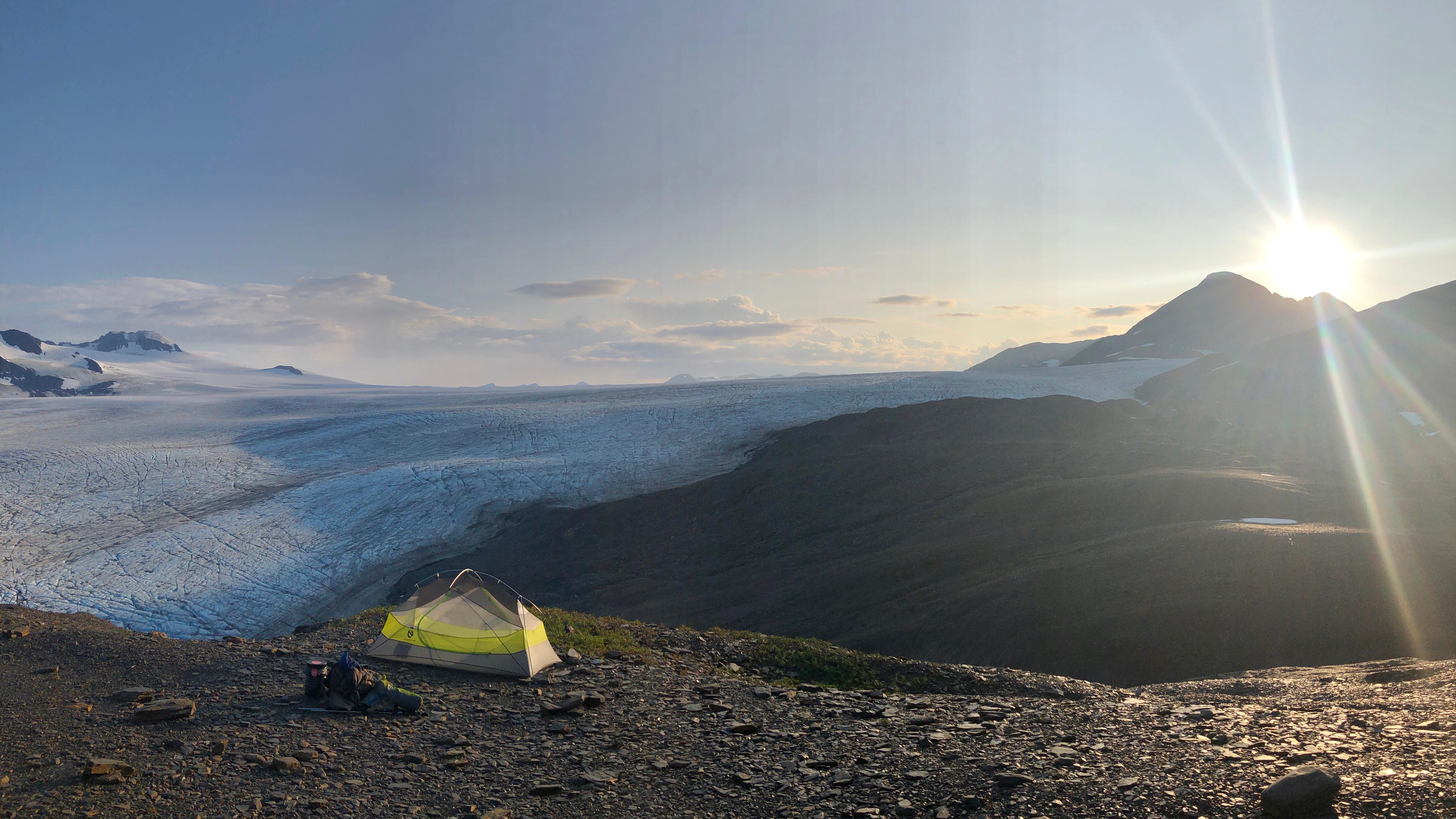 A tent with icefield beyond