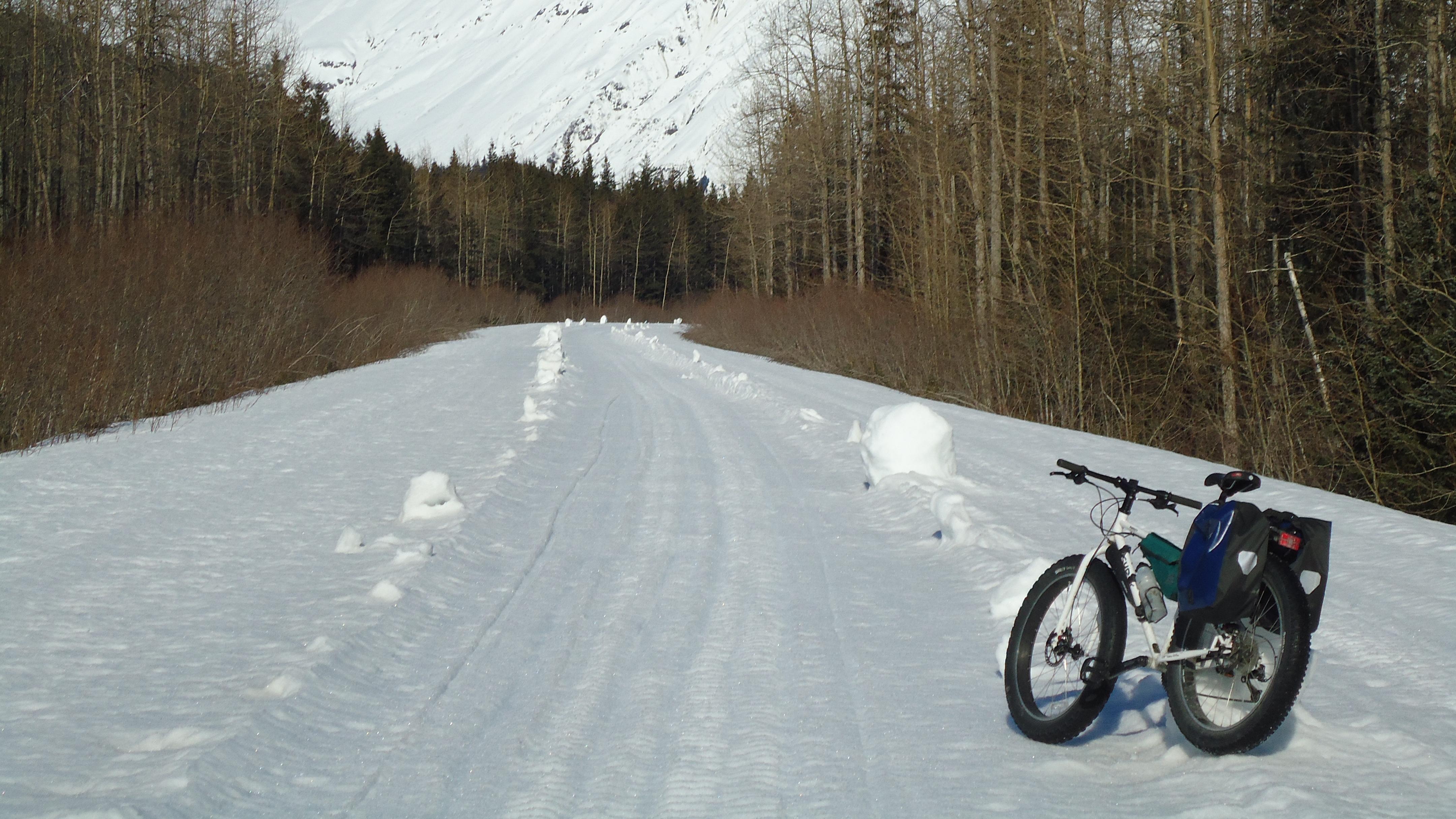 A fat tire bike on a snowy road