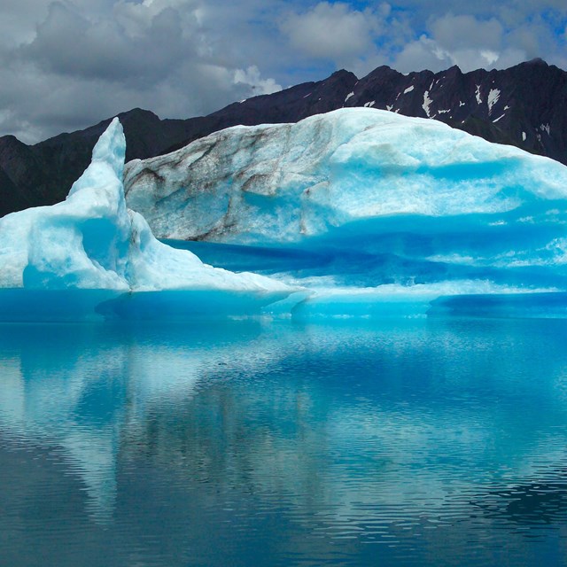 Blue iceberg floating in Bear Lagoon.