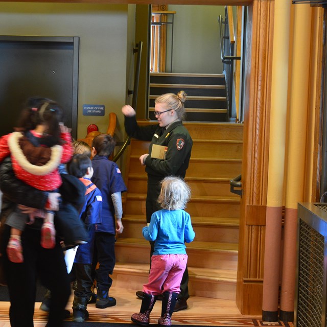 A ranger talks with kids and parents at the Calumet Visitor Center.