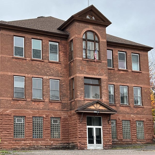 A three-story brick building