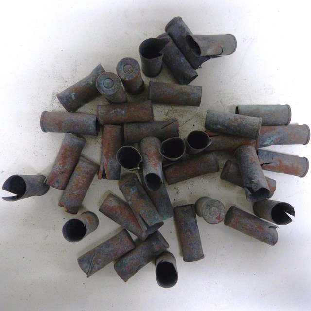 Cluster of metal cartridges on a neutral background