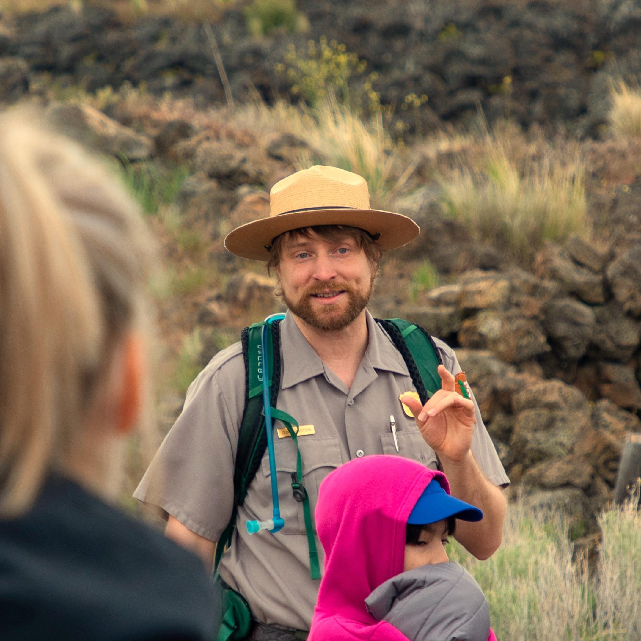 A park ranger giving at tour at Captain Jacks Stronghold.