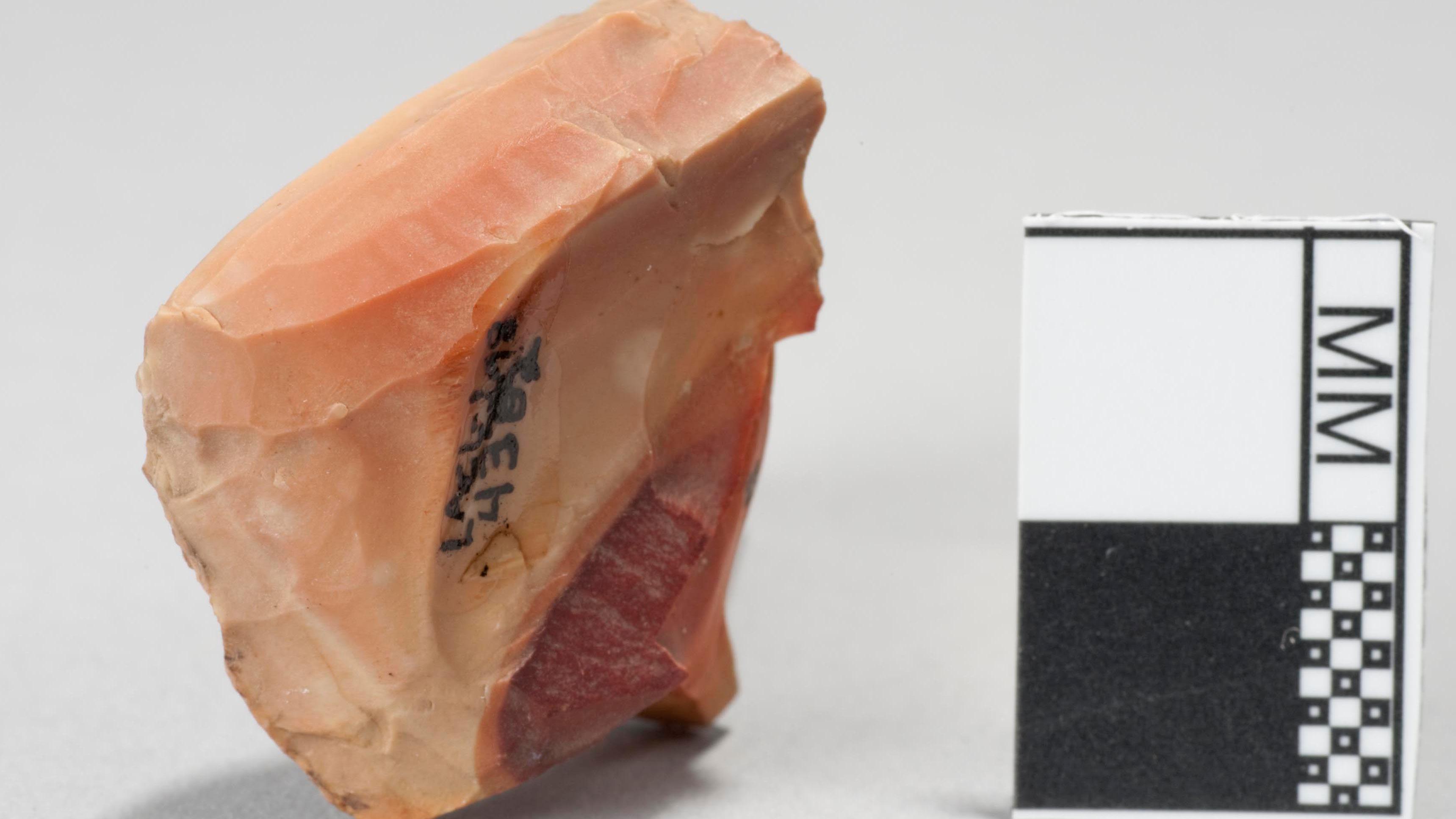 a peach colored microblade core