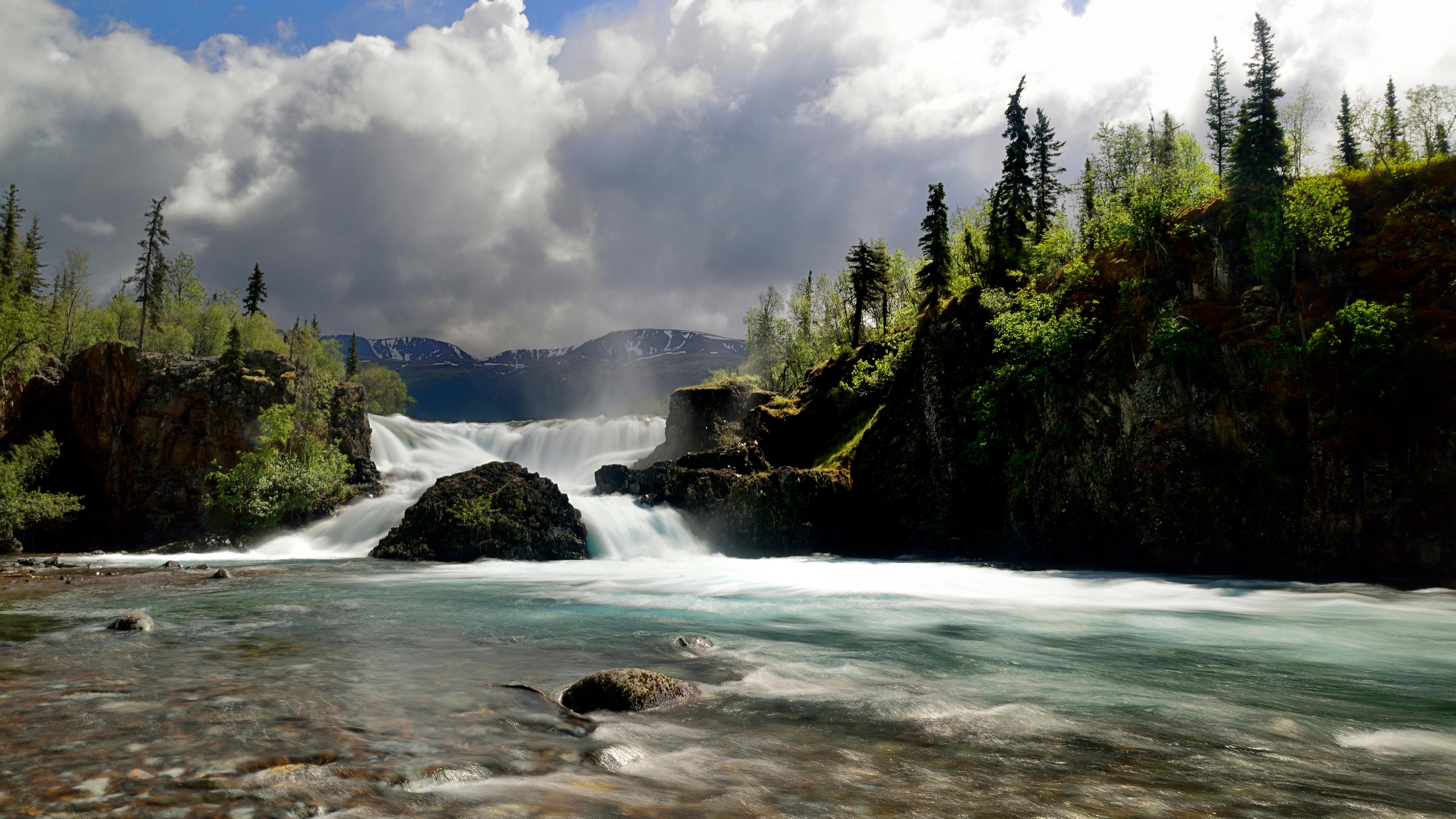 photo of a waterfall cascading down