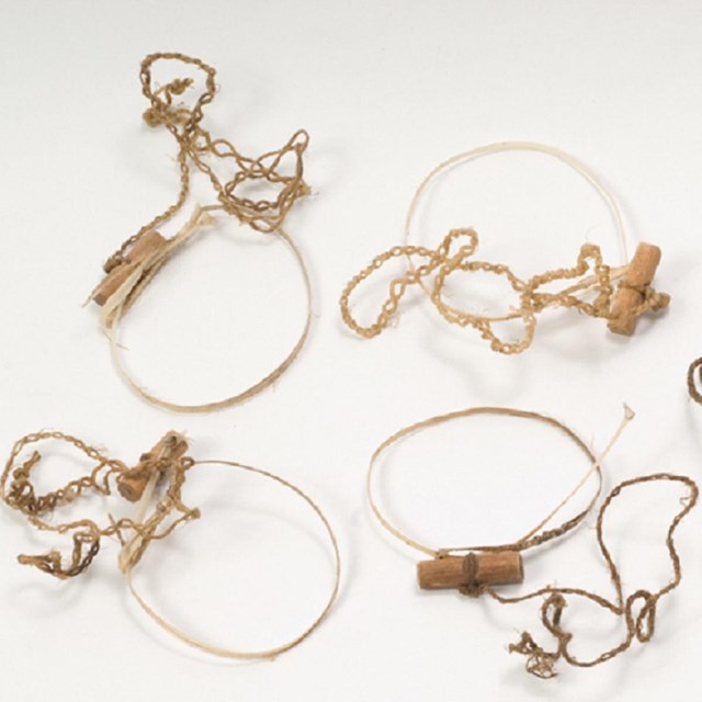 a group of wood and sinew animal snares